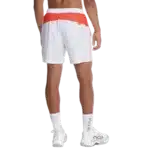Short Nox Team blanc short de padel technique et respirant conçu pour offrir confort liberté de mouvement et style sur le court porté par joueur vue de dos